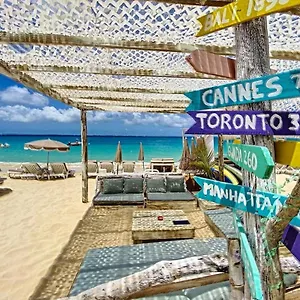 https://pavillon-beach-9-feet-in-the-water-in-grand-case.comcaribbean.com